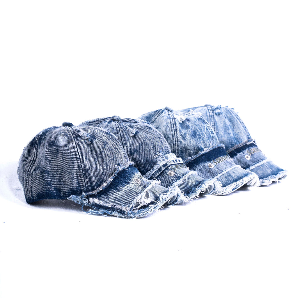 Denaro Denim Caps in washed blue denim, four caps in a row on a white background
