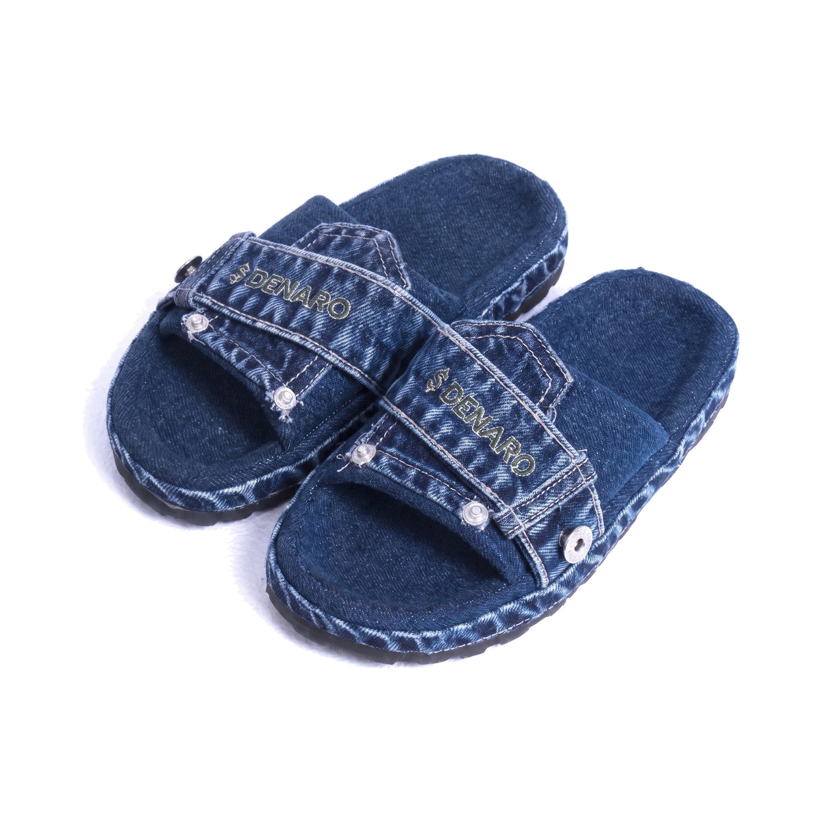 Denaro Denim Slide in deep indigo denim, pair at a three-quarter angle on a white background