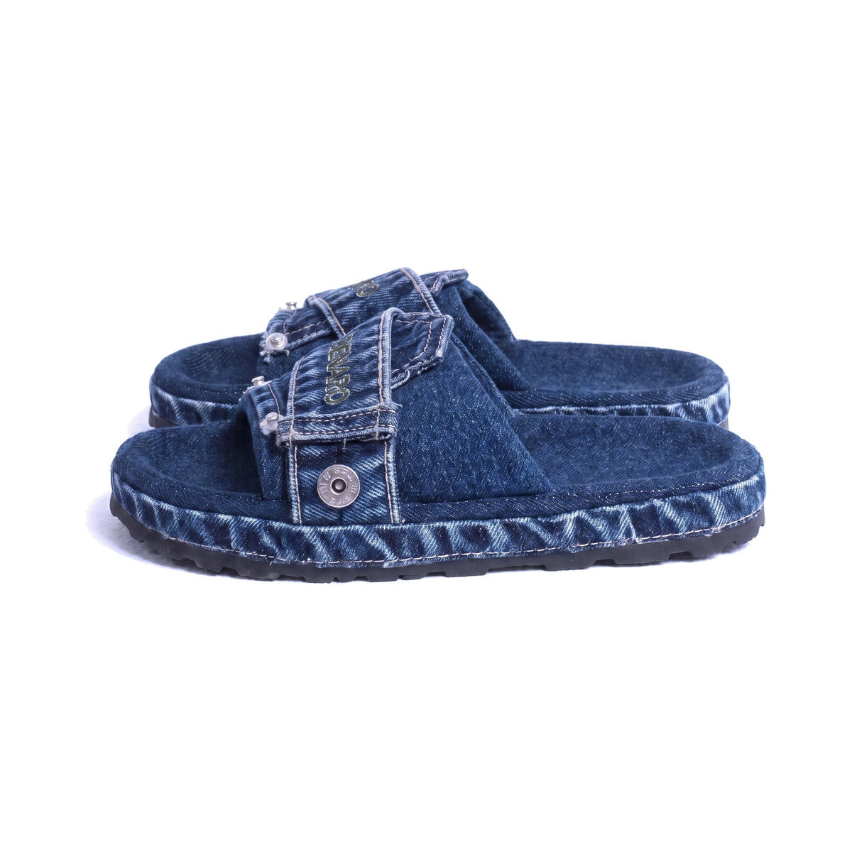 Denaro Denim Slide in deep indigo denim, side profile of the pair on a white background
