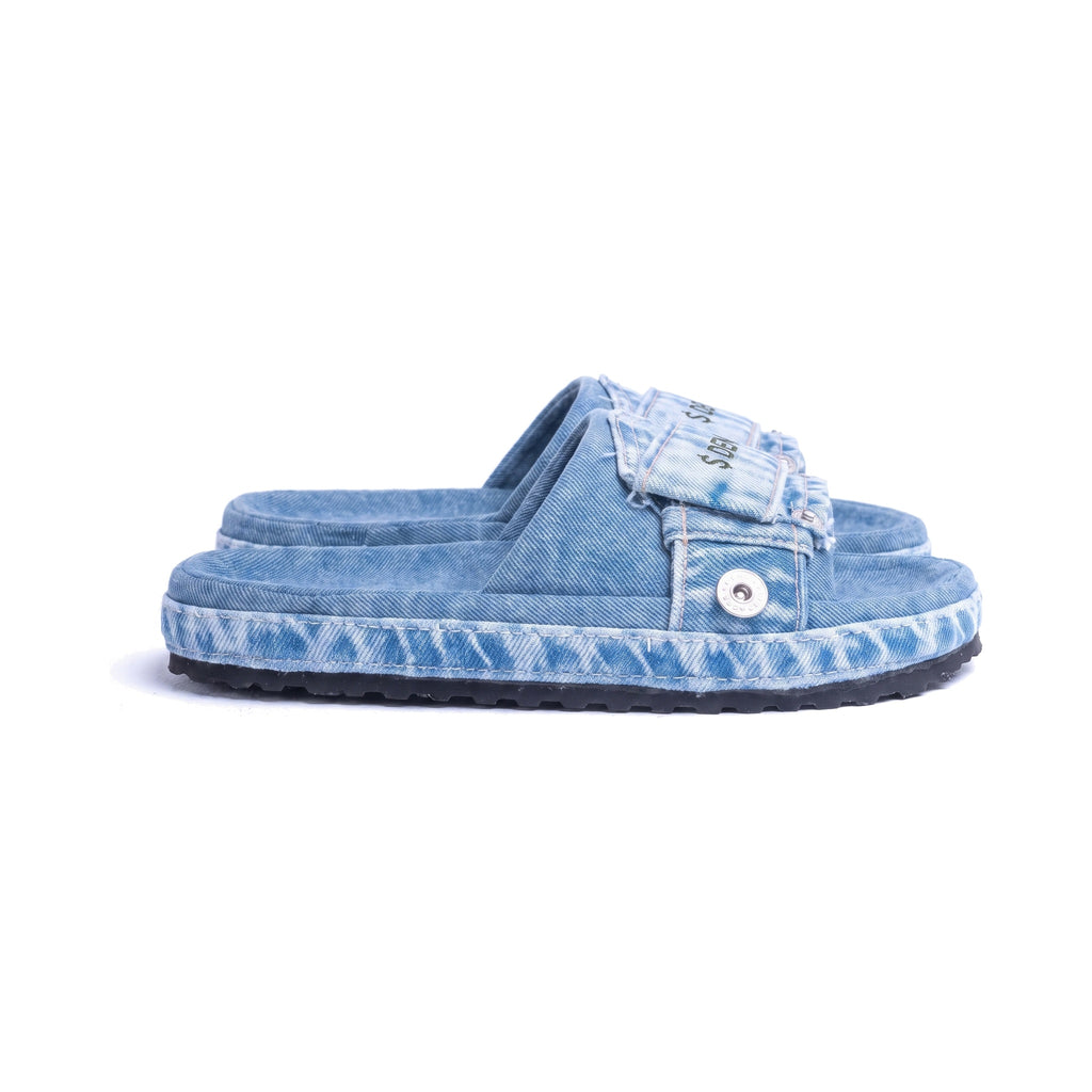 Denaro Denim Slide in light acid-wash denim, side profile of the pair on a white background
