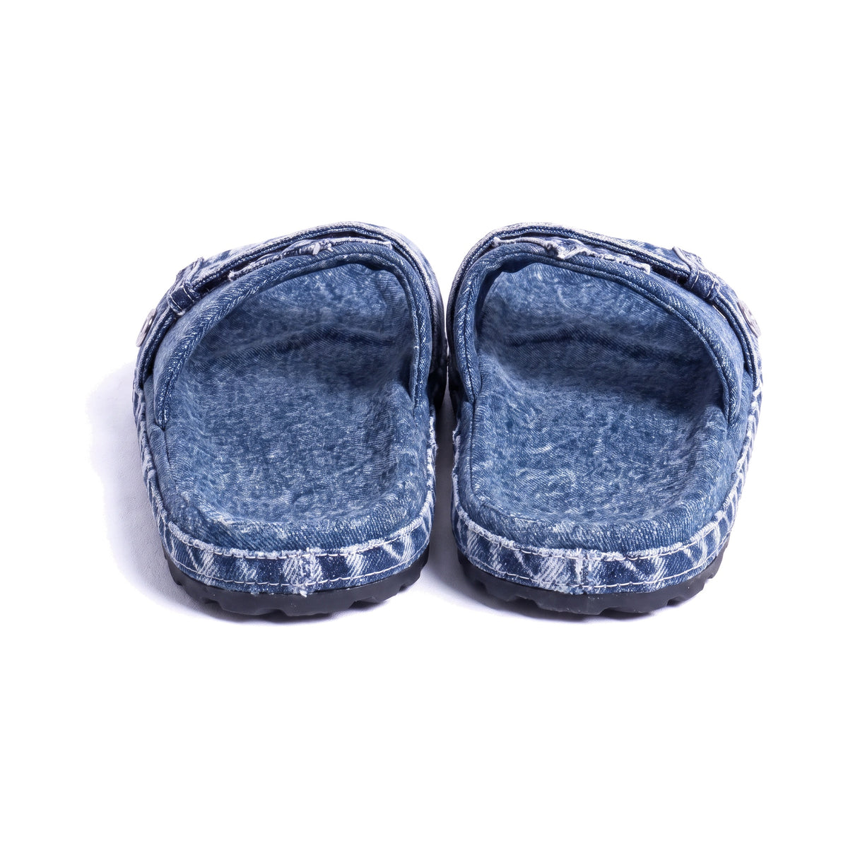 Denaro Denim Slide in mid-blue stone-wash denim, pair viewed from behind on a white background