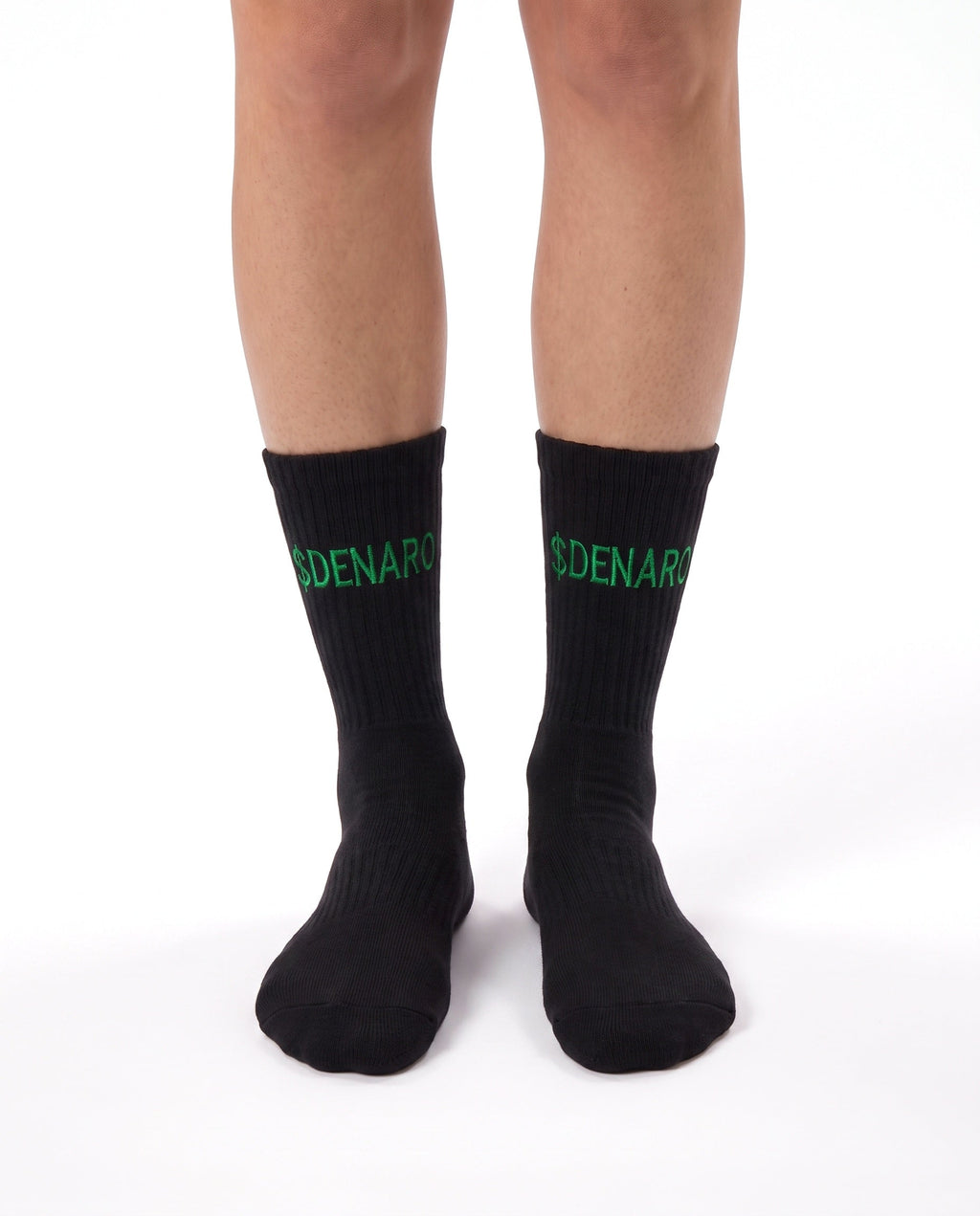 Denaro crew socks in black, worn